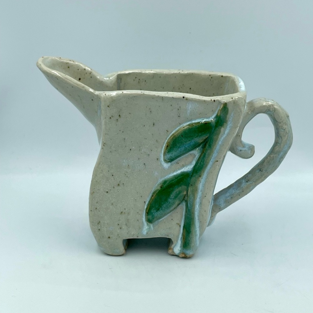 Studio pottery creamer handmade organic Freeform style applied leaf